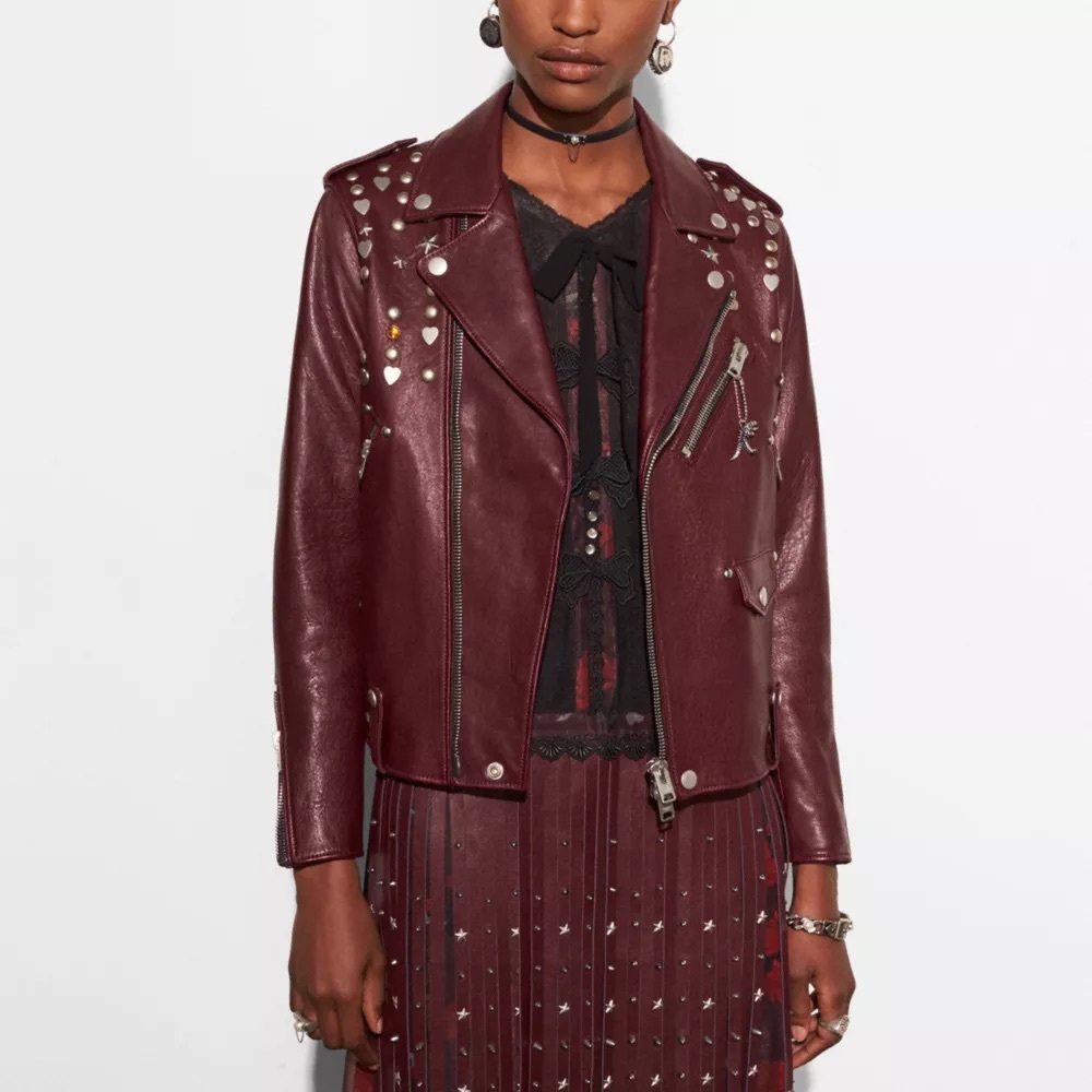 NWOT Coach plum leather embellished jacket with dino charm